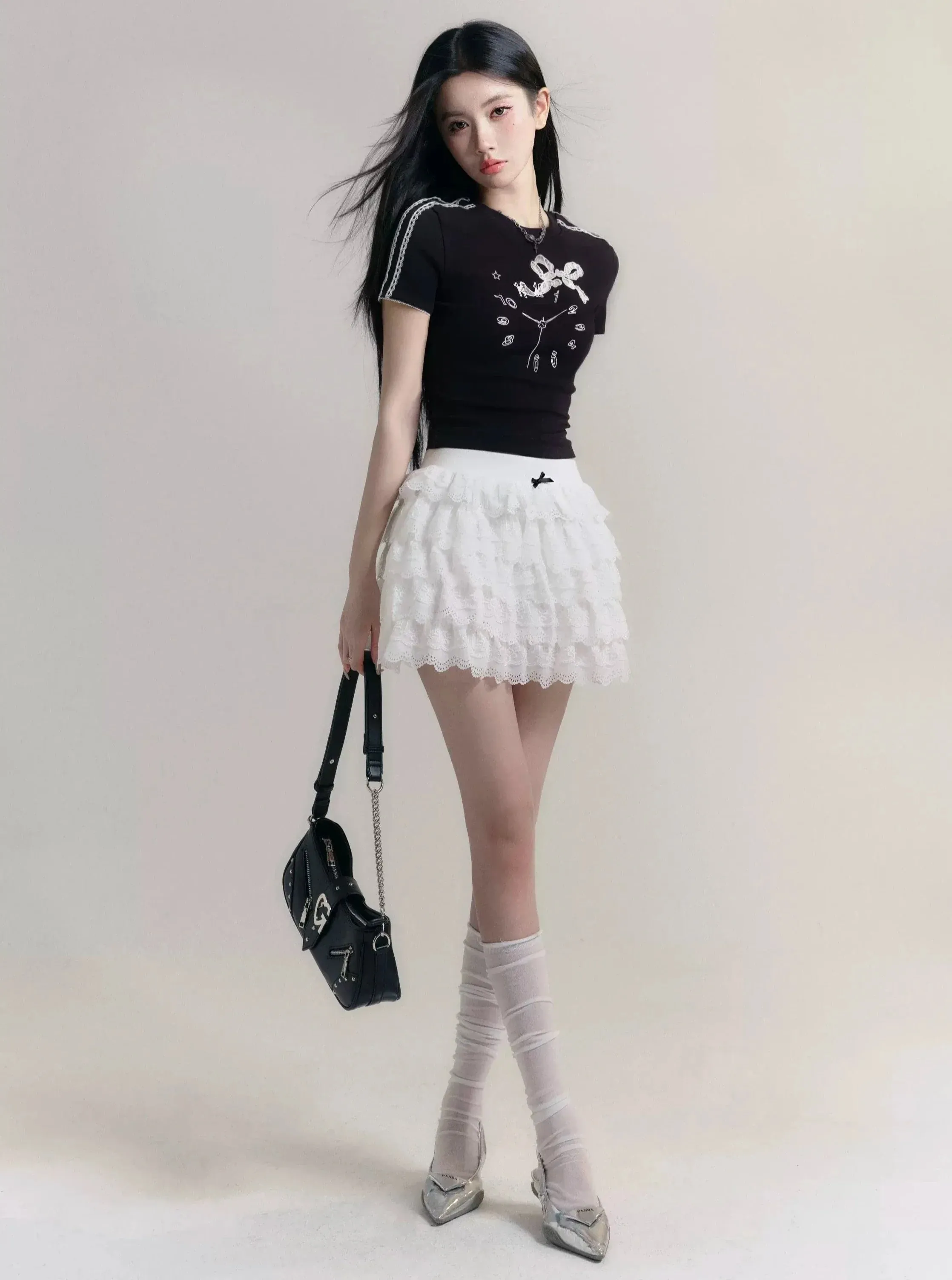 Angelic Tiers Mini Skirt: White Lace Ruffle Layers with Bow Accent