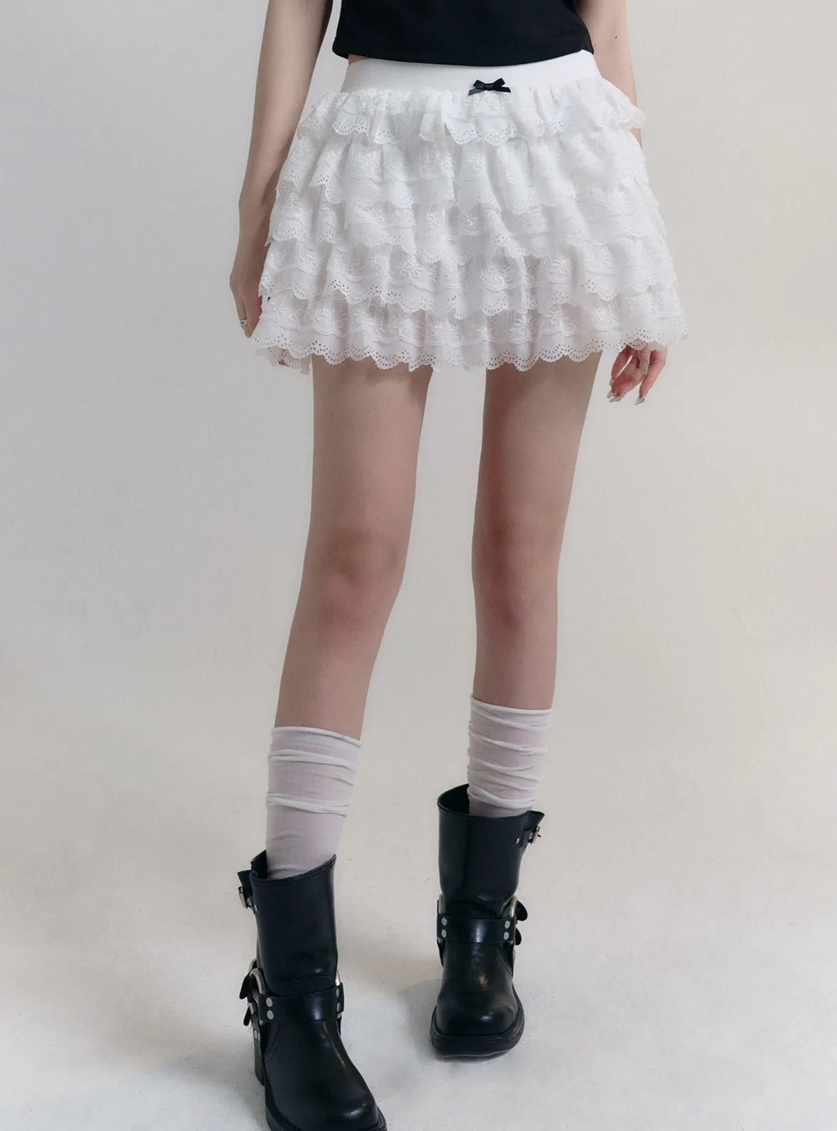 Angelic Tiers Mini Skirt: White Lace Ruffle Layers with Bow Accent